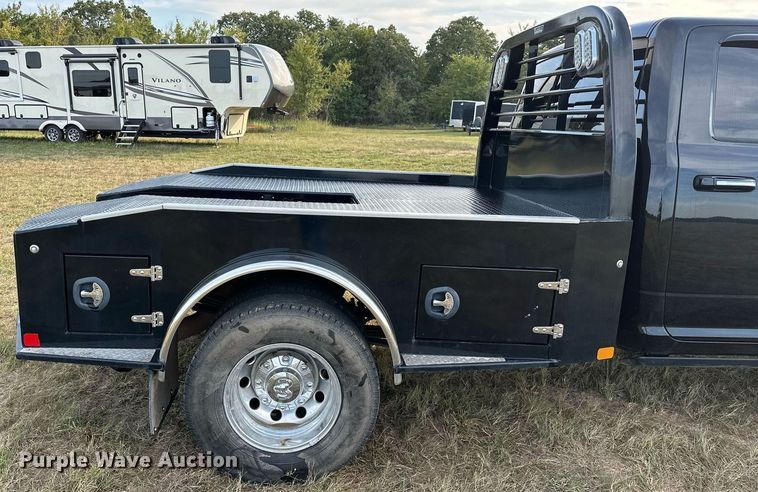 image for item NQ9365 2019 Dodge  Ram 3500 Laramie Crew Cab flatbed pickup truck