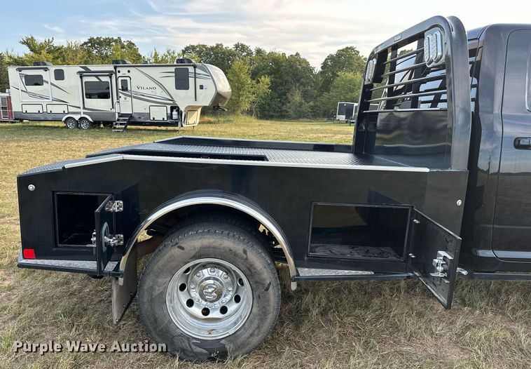 image for item NQ9365 2019 Dodge  Ram 3500 Laramie Crew Cab flatbed pickup truck