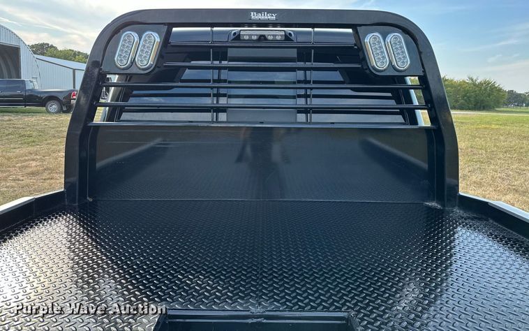 image for item NQ9365 2019 Dodge  Ram 3500 Laramie Crew Cab flatbed pickup truck