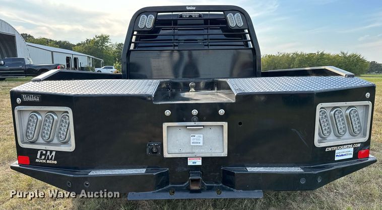 image for item NQ9365 2019 Dodge  Ram 3500 Laramie Crew Cab flatbed pickup truck