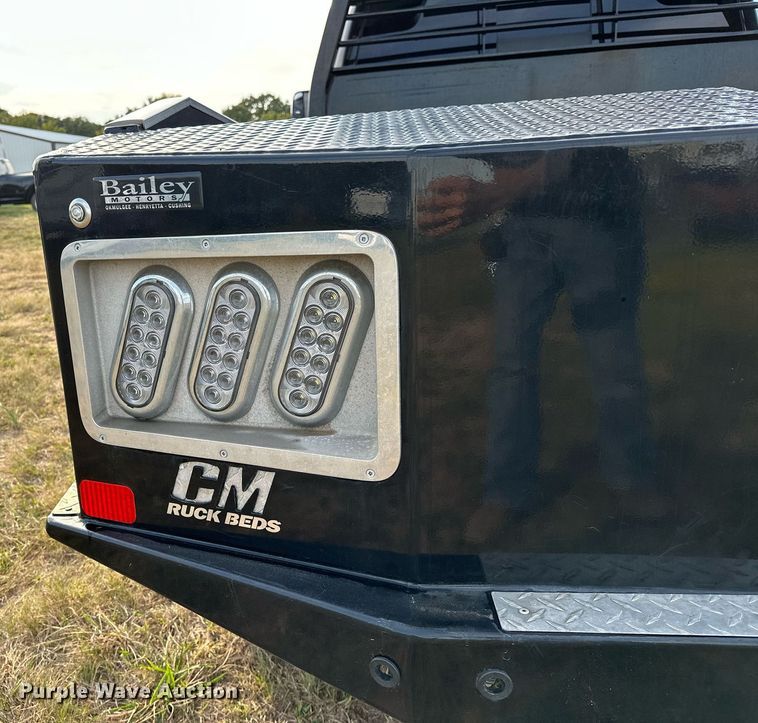 image for item NQ9365 2019 Dodge  Ram 3500 Laramie Crew Cab flatbed pickup truck