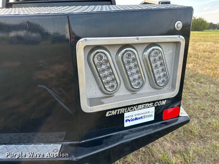 image for item NQ9365 2019 Dodge  Ram 3500 Laramie Crew Cab flatbed pickup truck