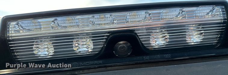 image for item NQ9365 2019 Dodge  Ram 3500 Laramie Crew Cab flatbed pickup truck