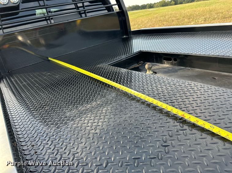 image for item NQ9365 2019 Dodge  Ram 3500 Laramie Crew Cab flatbed pickup truck