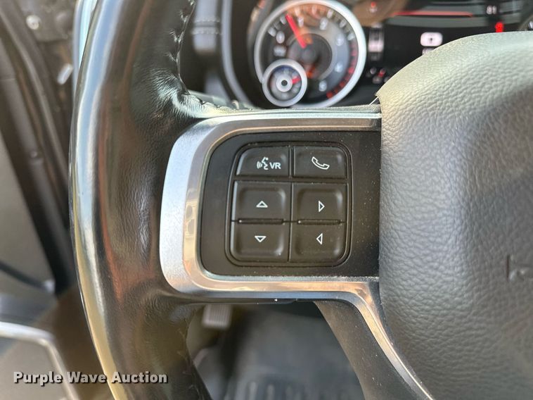 image for item NQ9365 2019 Dodge  Ram 3500 Laramie Crew Cab flatbed pickup truck