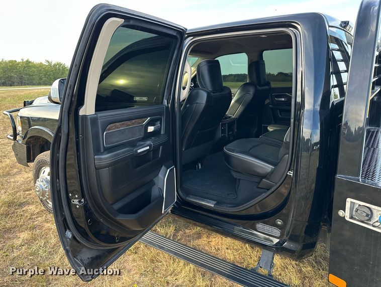 image for item NQ9365 2019 Dodge  Ram 3500 Laramie Crew Cab flatbed pickup truck