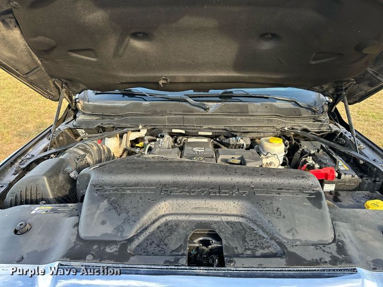 image for item NQ9365 2019 Dodge  Ram 3500 Laramie Crew Cab flatbed pickup truck