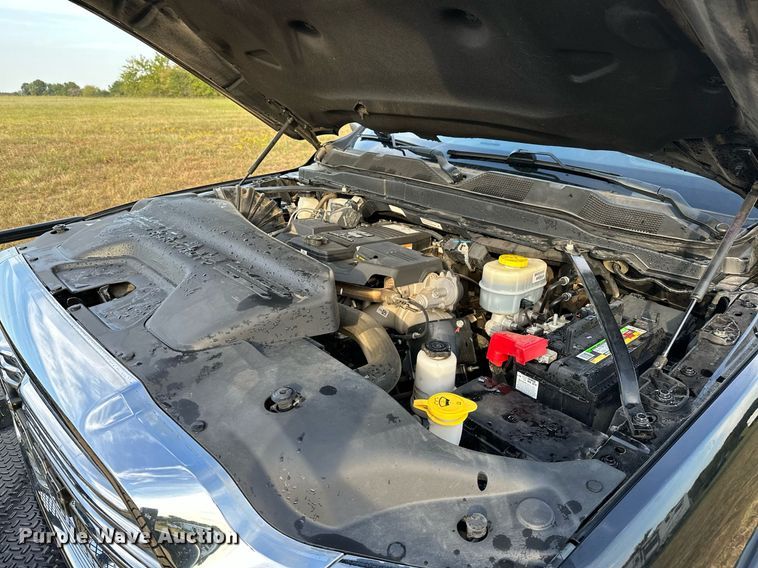 image for item NQ9365 2019 Dodge  Ram 3500 Laramie Crew Cab flatbed pickup truck