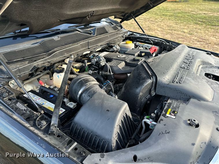 image for item NQ9365 2019 Dodge  Ram 3500 Laramie Crew Cab flatbed pickup truck