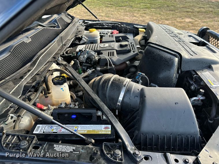 image for item NQ9365 2019 Dodge  Ram 3500 Laramie Crew Cab flatbed pickup truck