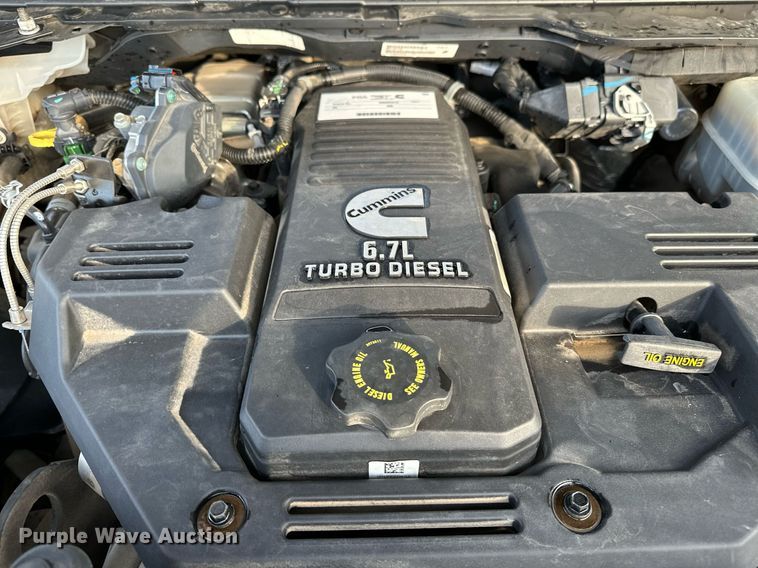 image for item NQ9365 2019 Dodge  Ram 3500 Laramie Crew Cab flatbed pickup truck