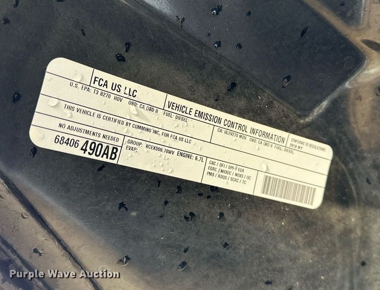 image for item NQ9365 2019 Dodge  Ram 3500 Laramie Crew Cab flatbed pickup truck