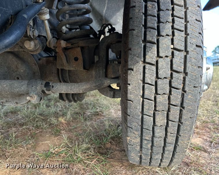 image for item NQ9365 2019 Dodge  Ram 3500 Laramie Crew Cab flatbed pickup truck