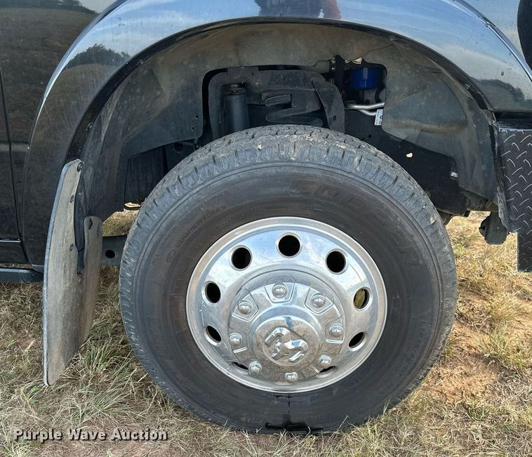 image for item NQ9365 2019 Dodge  Ram 3500 Laramie Crew Cab flatbed pickup truck