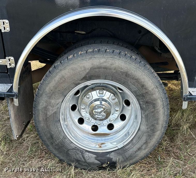 image for item NQ9365 2019 Dodge  Ram 3500 Laramie Crew Cab flatbed pickup truck