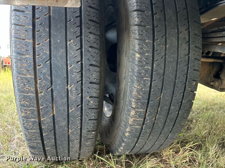 image for item NQ9365 2019 Dodge  Ram 3500 Laramie Crew Cab flatbed pickup truck