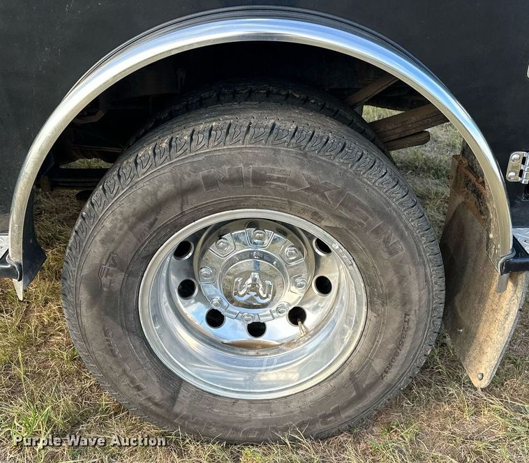 image for item NQ9365 2019 Dodge  Ram 3500 Laramie Crew Cab flatbed pickup truck