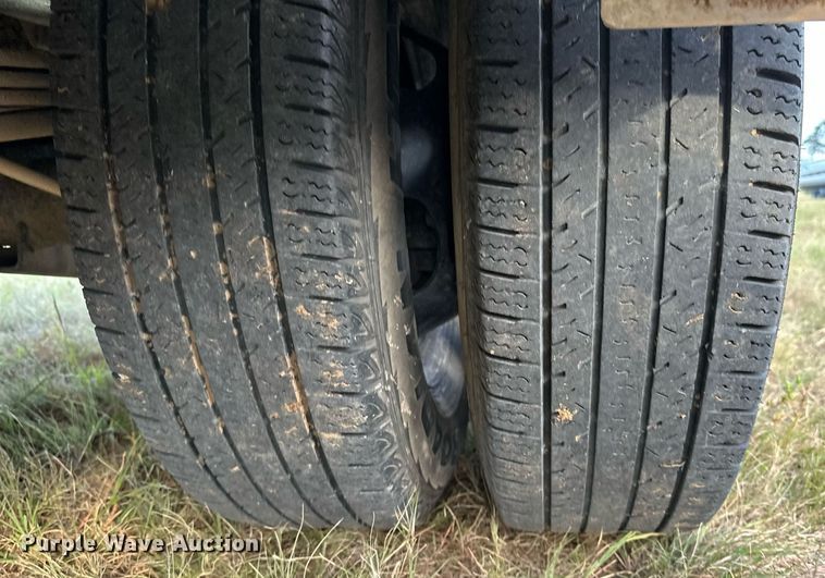 image for item NQ9365 2019 Dodge  Ram 3500 Laramie Crew Cab flatbed pickup truck