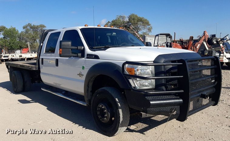 image for item OF9526 2014 Ford F550 Super Duty  Crew Cab flatbed truck