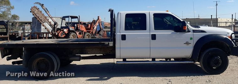 image for item OF9526 2014 Ford F550 Super Duty  Crew Cab flatbed truck
