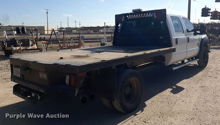 image for item OF9526 2014 Ford F550 Super Duty  Crew Cab flatbed truck