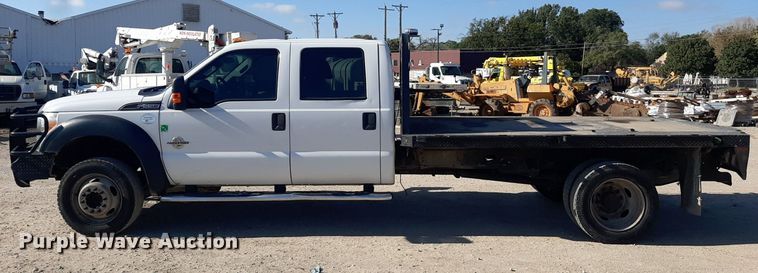 image for item OF9526 2014 Ford F550 Super Duty  Crew Cab flatbed truck