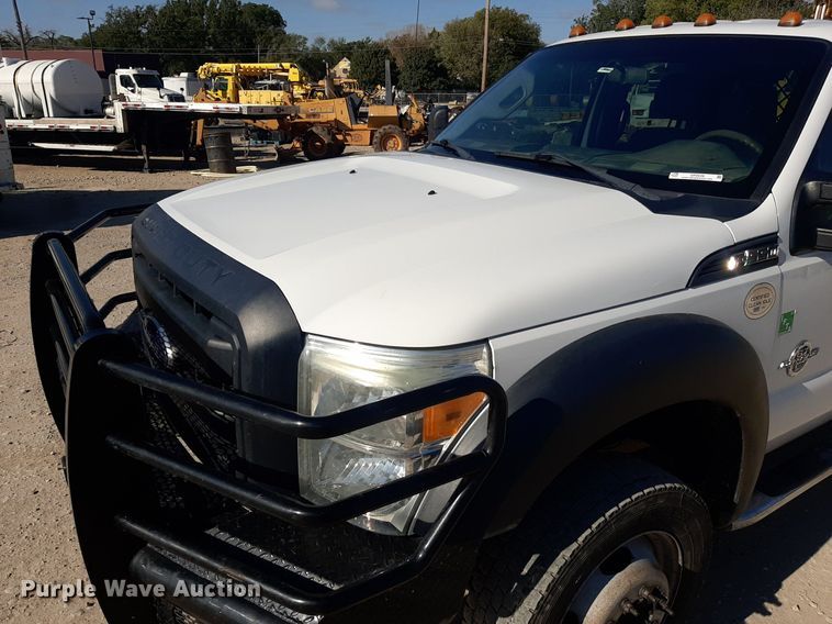 image for item OF9526 2014 Ford F550 Super Duty  Crew Cab flatbed truck