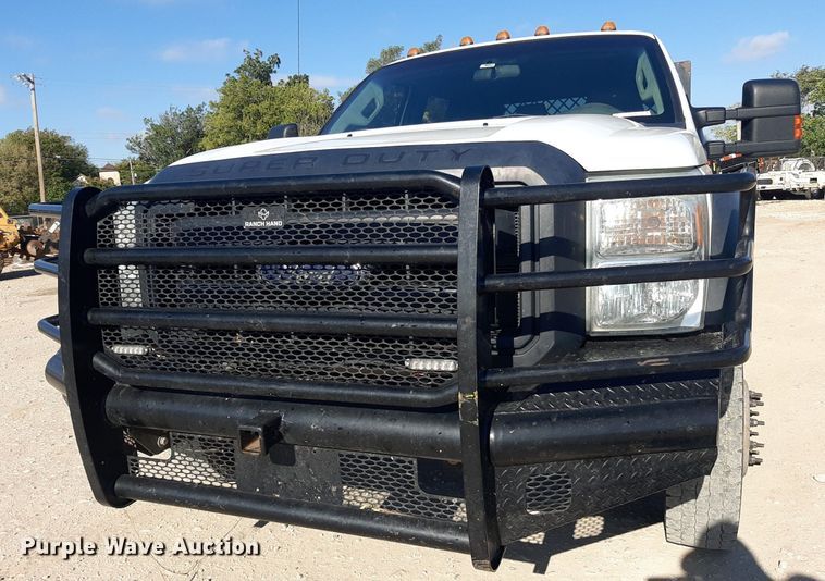image for item OF9526 2014 Ford F550 Super Duty  Crew Cab flatbed truck