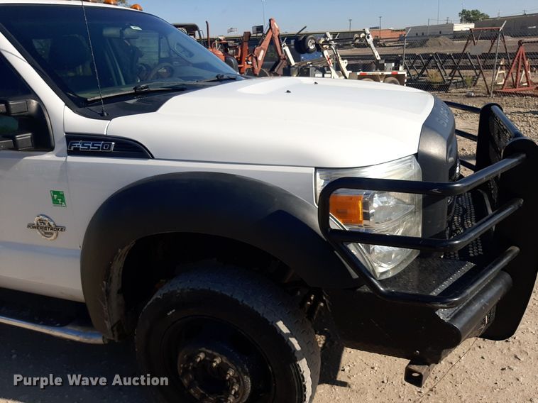 image for item OF9526 2014 Ford F550 Super Duty  Crew Cab flatbed truck