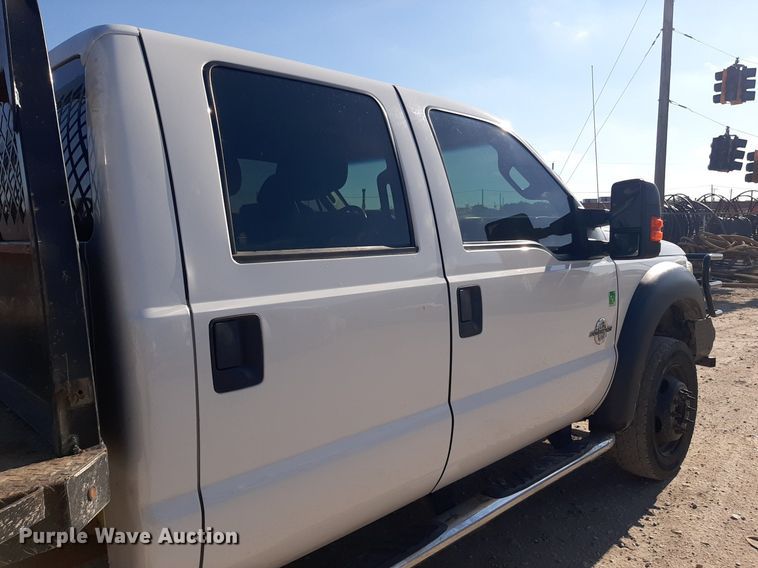 image for item OF9526 2014 Ford F550 Super Duty  Crew Cab flatbed truck