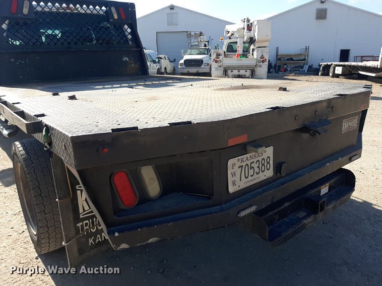 image for item OF9526 2014 Ford F550 Super Duty  Crew Cab flatbed truck