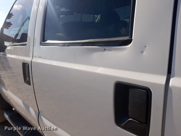 image for item OF9526 2014 Ford F550 Super Duty  Crew Cab flatbed truck