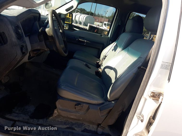 image for item OF9526 2014 Ford F550 Super Duty  Crew Cab flatbed truck