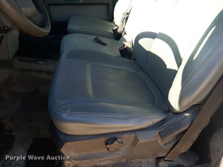 image for item OF9526 2014 Ford F550 Super Duty  Crew Cab flatbed truck