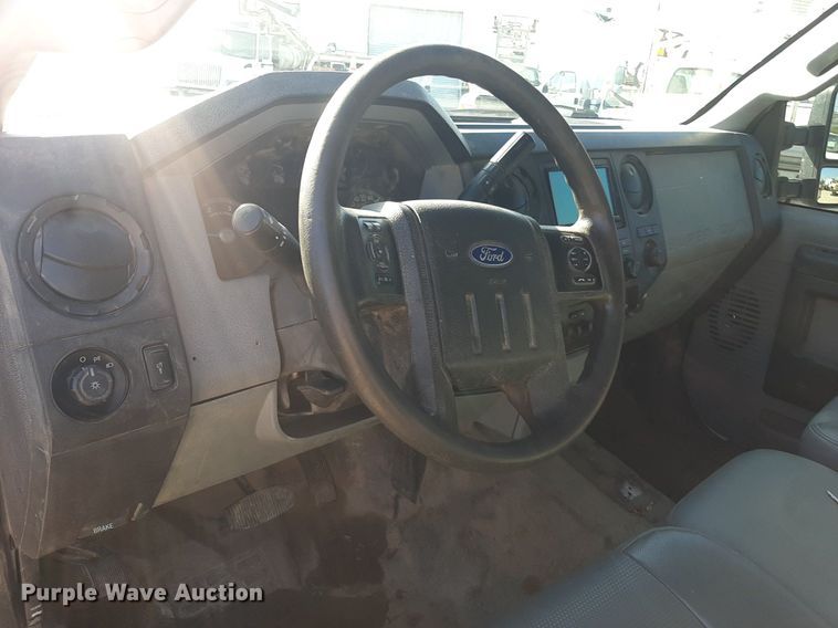 image for item OF9526 2014 Ford F550 Super Duty  Crew Cab flatbed truck