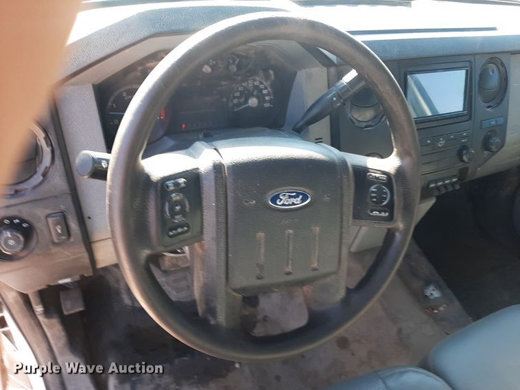 image for item OF9526 2014 Ford F550 Super Duty  Crew Cab flatbed truck