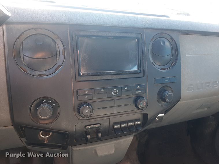 image for item OF9526 2014 Ford F550 Super Duty  Crew Cab flatbed truck