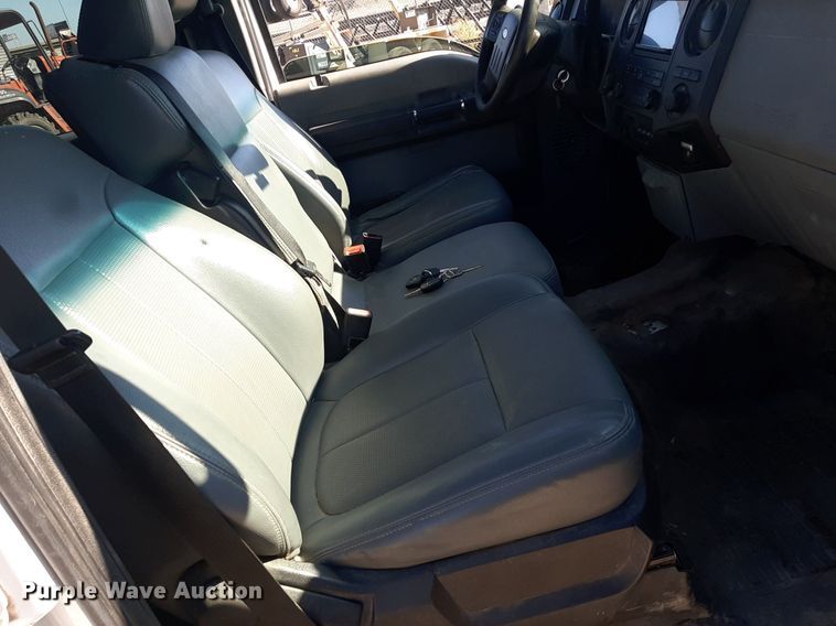 image for item OF9526 2014 Ford F550 Super Duty  Crew Cab flatbed truck