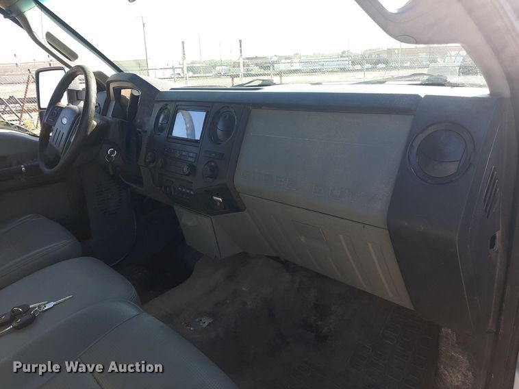 image for item OF9526 2014 Ford F550 Super Duty  Crew Cab flatbed truck