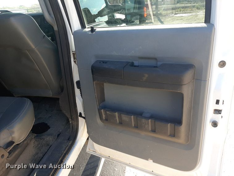 image for item OF9526 2014 Ford F550 Super Duty  Crew Cab flatbed truck