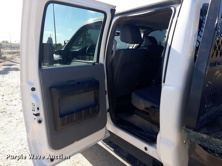 image for item OF9526 2014 Ford F550 Super Duty  Crew Cab flatbed truck