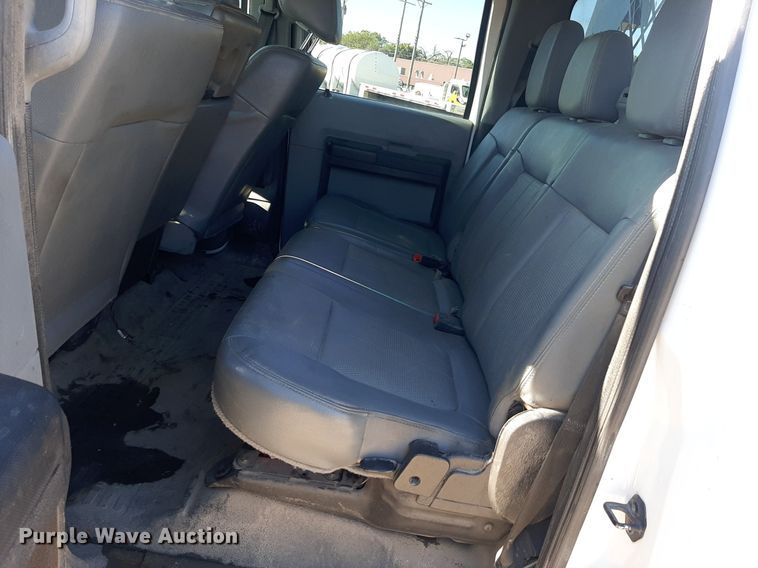 image for item OF9526 2014 Ford F550 Super Duty  Crew Cab flatbed truck