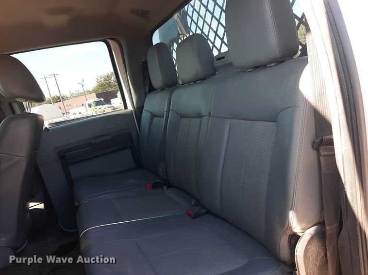 image for item OF9526 2014 Ford F550 Super Duty  Crew Cab flatbed truck