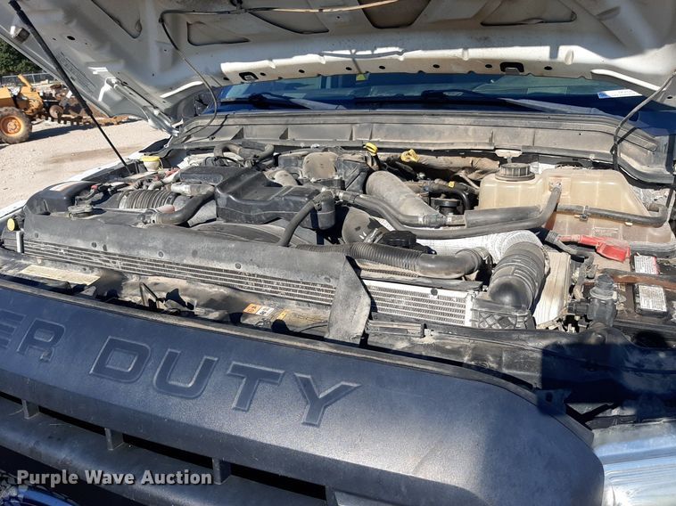 image for item OF9526 2014 Ford F550 Super Duty  Crew Cab flatbed truck