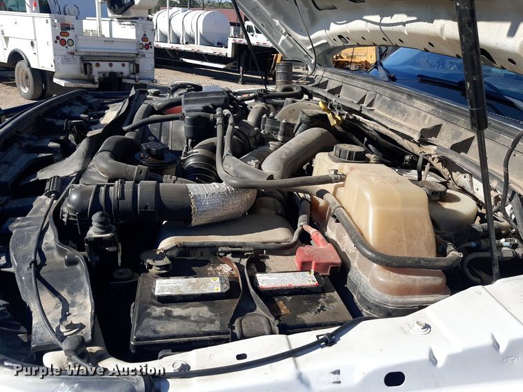 image for item OF9526 2014 Ford F550 Super Duty  Crew Cab flatbed truck