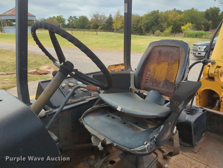 image for item OL9057 1983 John Deere 510B  backhoe