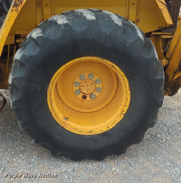 image for item OL9057 1983 John Deere 510B  backhoe