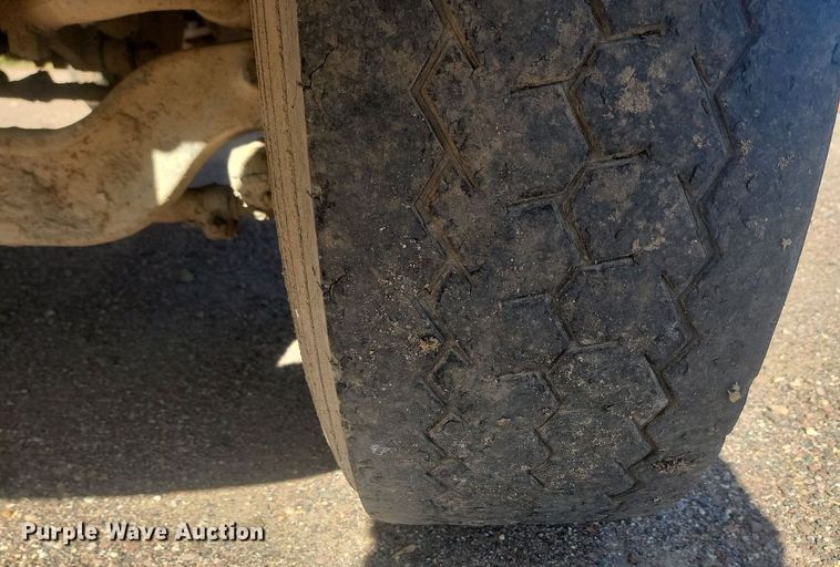 image for item JG9776 1993 Mack RD690S  water truck