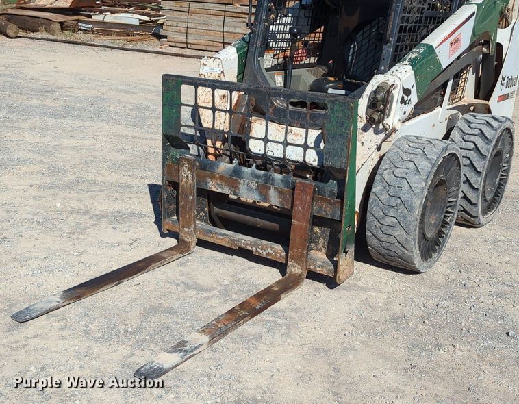 image for item LY9349 2014 Bobcat S590  skid steer loader