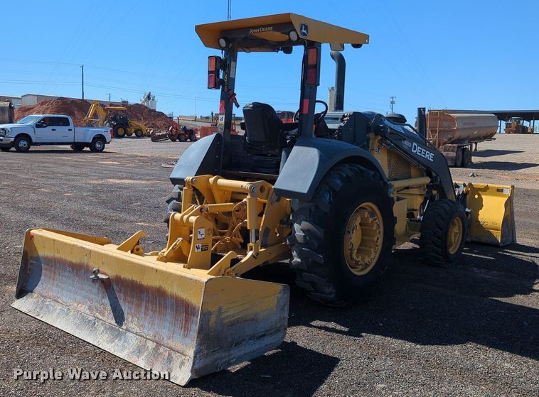 image for item LY9442 2014 John Deere 210K  landscape tractor